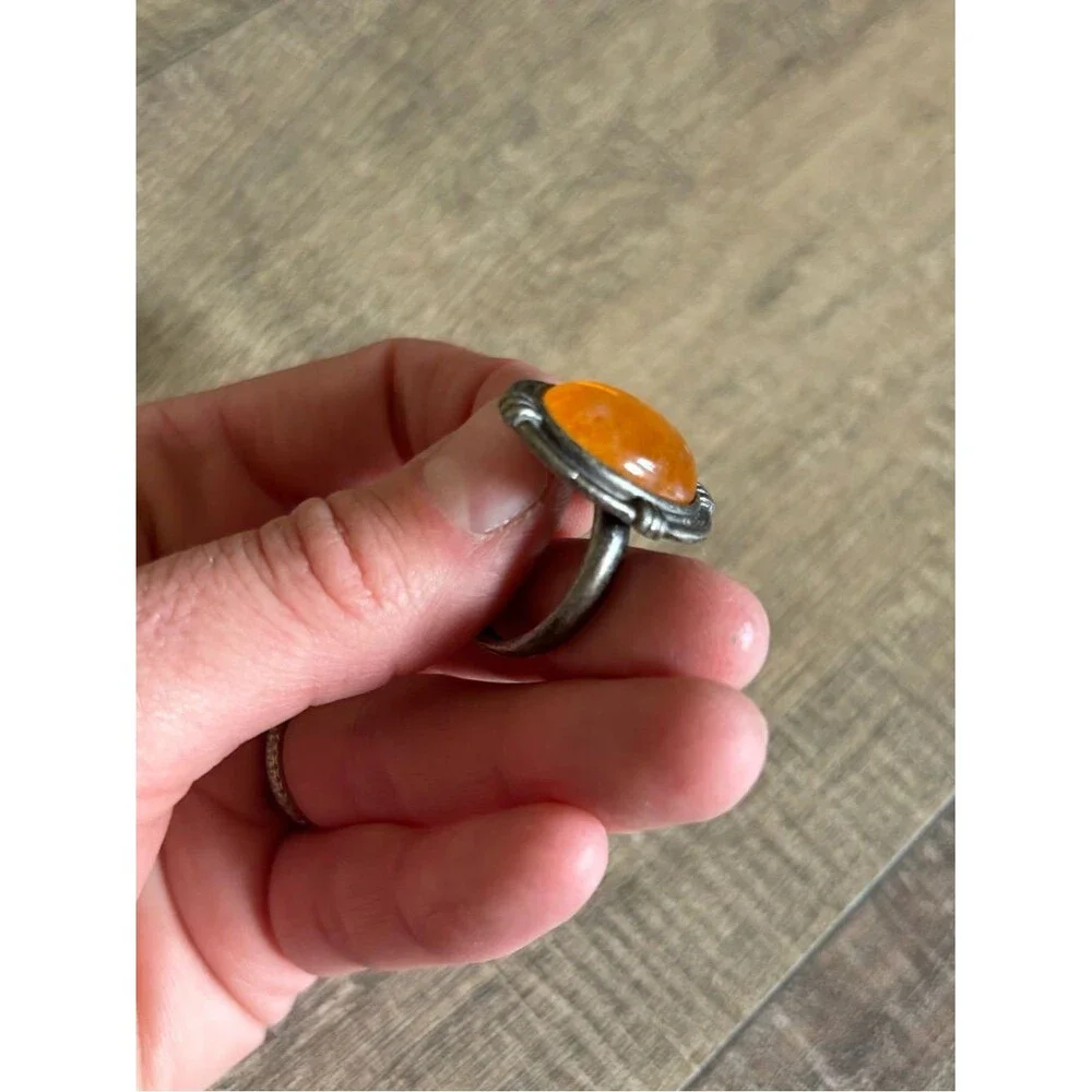 Untested women’s size 13.5 metal butterscotch amber or orange spiny oyster ring